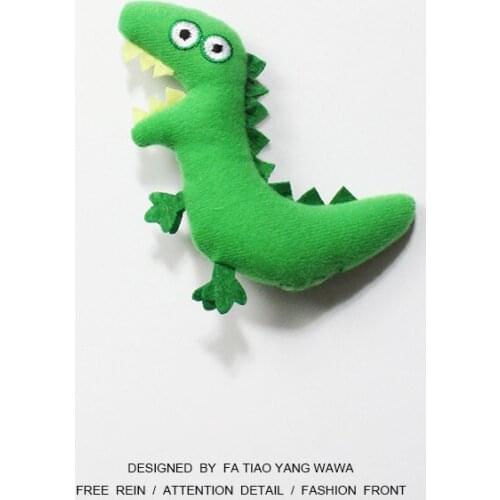 Dinosaur brooch