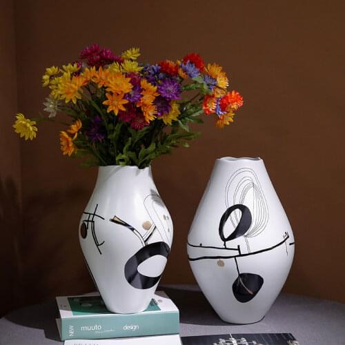 Modern minimalist painting abstract ceramic vase Modern home soft design Home living room TV cabinet ornaments