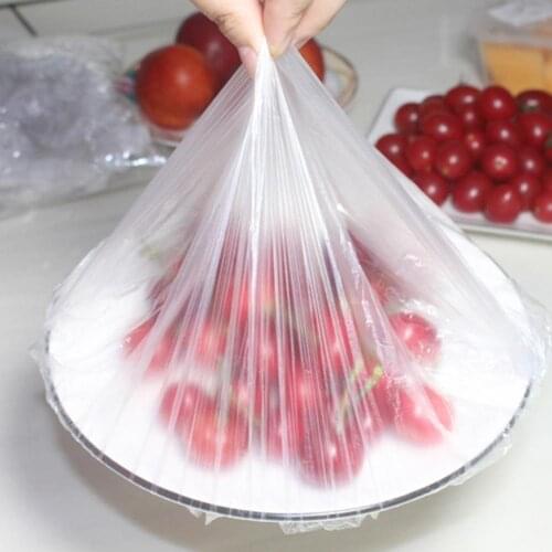 50/100Pcs Food Storage Covers Reusable Dish Plate Clings Film Wraps Bowl Covers Fresh Keeping Caps For Refrigerator Kitchen 2021