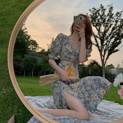 2021 new one-step cut hollow cheongsam French retro platycodon skirt trumpet sleeve floral dress