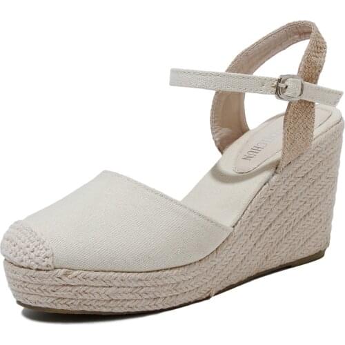 2021 new spring and summer sandals female fairy grass wedge heel Baotou Roman fisherman shoes linen canvas shoes
