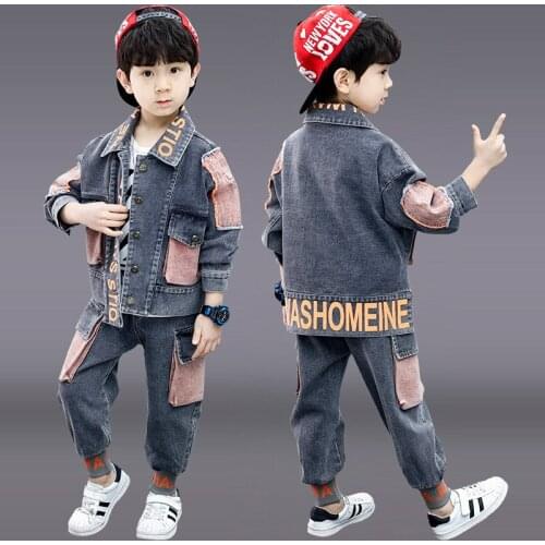 Boys spring / fall sports suit spell color denim jacket + pants 2pcs sets of new big virgin Kids
