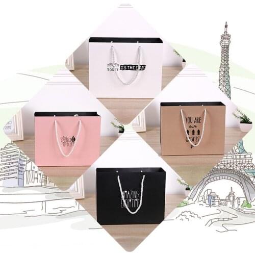 Wholesale Printed retail Logo paper shopping bag with handle