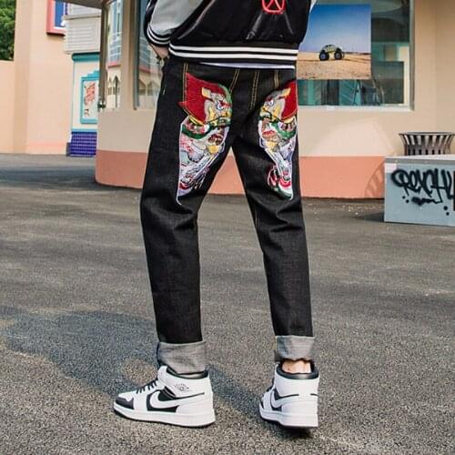 2021 autumn and winter personality trend China-style tide ghost head rear bag embroidery loose straight slim teen jeans