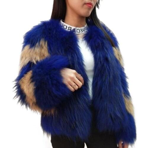 Autumn and winter new white braid hair coat female whole skin in the long paragraph Real raccoon dog fur coat