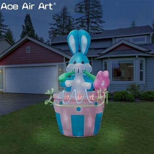 New design easter yard lighting inflatable blue rabbit sit basket with easterlily flower