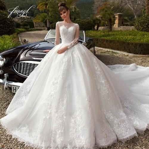 Fmogl Sexy Illusion Long Sleeve Lace Ball Gown Wedding Dresses 2021 Luxury Appliques Beaded Chapel Train Princess Bridal Gowns
