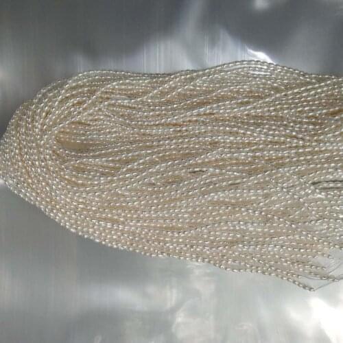 Free shipping 39 cm ,2-3 mm MINI rice FRESHWATER PEARL BEADS,100% NATURE freshwater pearl material with OVAL shape-AA quality