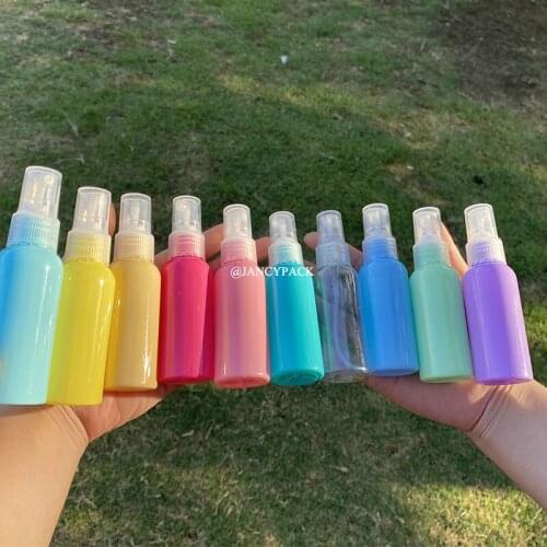 Pink purple blue clear 50ml Plastic Empty Spray Bottle Refillable Press Pump Perfume Atomizer Travel Oils Liquid Containers