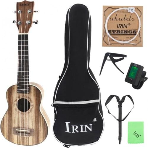 21 Inch Soprano Ukulele Zebra Wood 15 Fret Four Strings Guitar + Bag + Tuner + String + Strap + Cloth