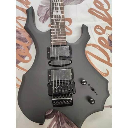 Fashion shaped black electric guitar, professional performance, our shop can customize all kinds of styles of guitar