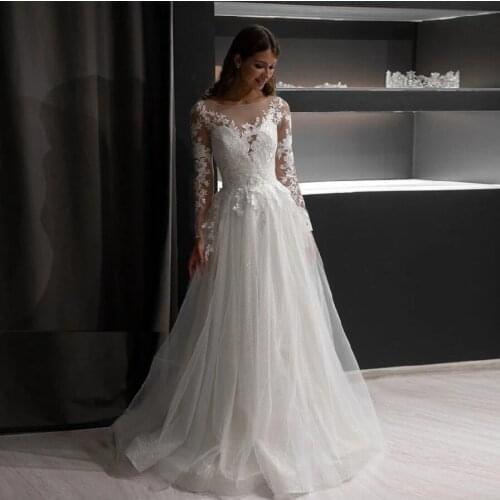 Sparkling A Line Wedding Dresses Scoop Long Sleeves Lace Appliques Bridal Gown Court Train Button Illusion Vestido De Noiva 2020
