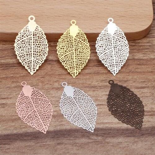 BASEHOME 20pcs/lot Hollow Leaf Pendant Charms Vintage Metal Leaf Jewelry Findings for DIY Fashion Necklace Women