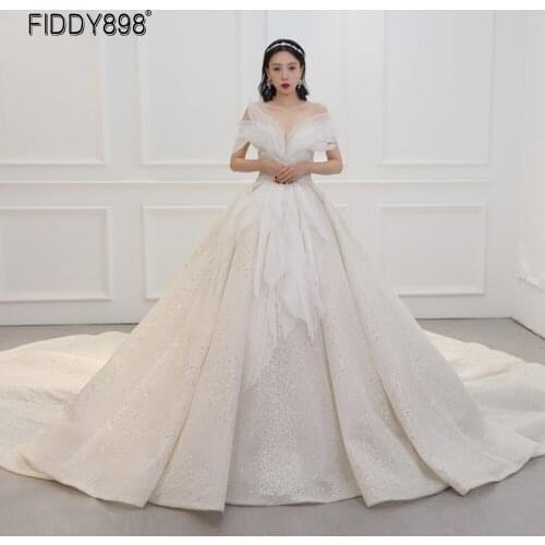 Shining Dubai Ball Gown Wedding Dress Off-shoulder Bride Dress Luxury Beaded Long Train Beaded Wedding Dresses for Women 2020