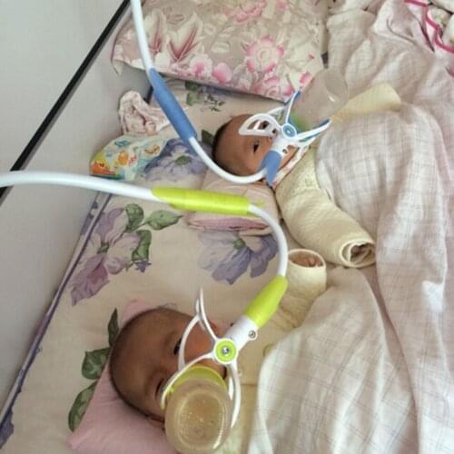 New Universal Stroller Bottle Holders Accessory Hands-free Adjustable Bottle Clip Holder on Baby Strollers Bed Feeding Accessory