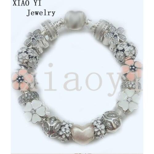 XIAOYI 2020 New 100% S925 Series of orange flowers and white flowers Zircon with dense foliage Hollow out bracelet female