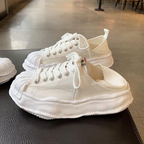 Web celebrity thick soled canvas dissolving shoes womens two wear tide step to go with the new lightweight shell head shoes