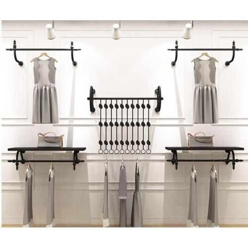 Clothes store display rack wall mens and womens wear vintage shelves childrens wear wall hanging clothes rack rack display