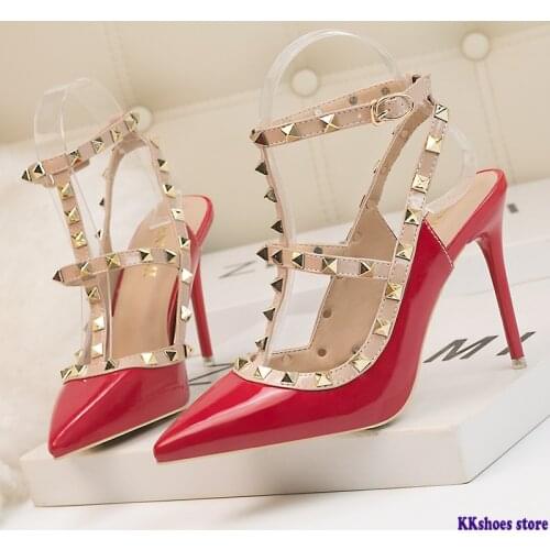 Thin heel pointed high-heeled shoes patent leather solid color rivet Roman hollow sandals female