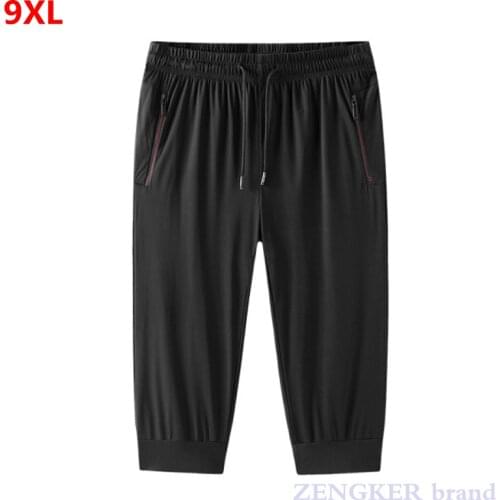 Summer thin ice silk cropped sports trousers mens loose high-stretch casual pants quick-drying extra large size men joggers