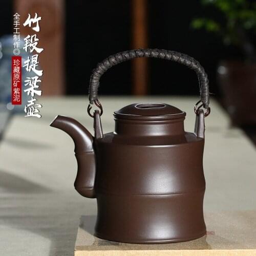 Wholesale yixing undressed ore purple clay pot bamboo section girder kung fu tea set gift a undertakes by hand