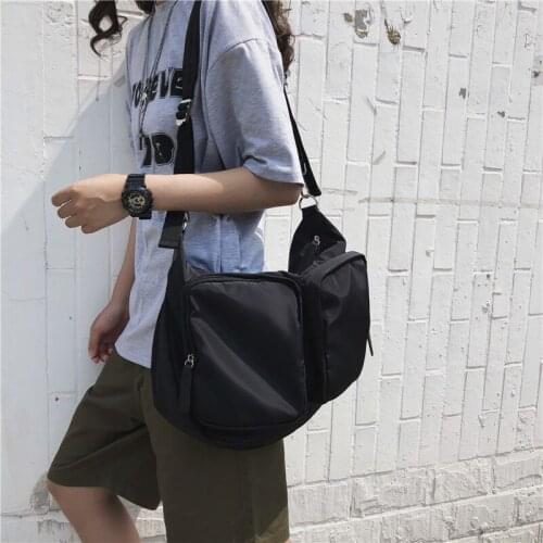 Nylon messenger bag with multi-pocket and large capacity waterproof function Wind tool bag is simple and solid color