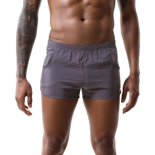 Sexy Mens Low Waist Boxers Shorts with Pockets Beachwear Solid Color Summer Shorts Quick-drying Surfing Swimming Trunks Swimwear