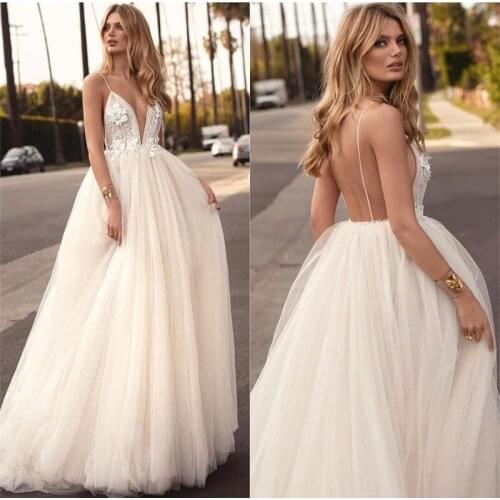 Sexy Deep V-Neck Wedding Dresses Lace Applique Spaghetti Straps Backless Puffy Bridal Gowns A-Line Sleeveless Puffy Beach Gown