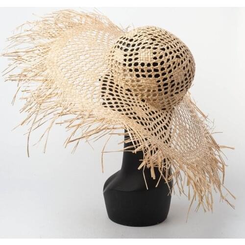 Spring and summer new hand-hollowed braided big hair rafite straw hat outdoor sunshade beach rafite grass hat folding bow