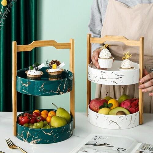 Nordic home living room swing ceramic gold double-layer fruit plate with bamboo hand round fruit basket dried fruit plate