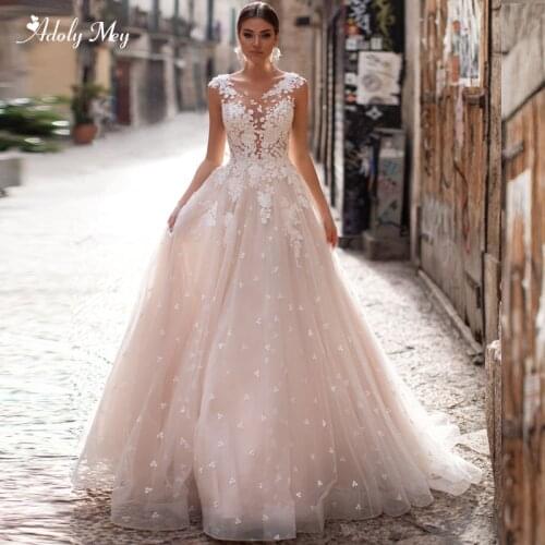 Adoly Mey Romantic Scoop Neck Backless A-Line Wedding Dress 2020 Cap Sleeve Appliques Brush Train Princess Bride Gown Plus Size