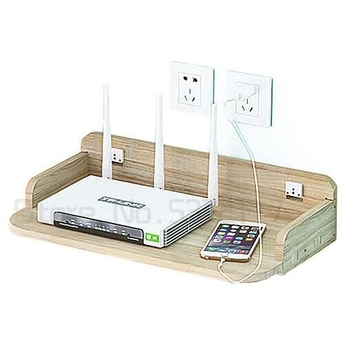 The TV set-top box rack on the hole free wall in the living room houses the wall mounted rack at the head of the bed