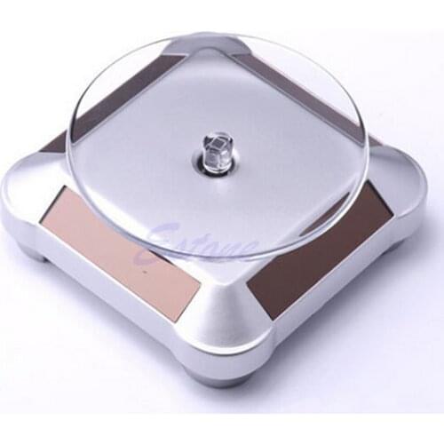 Solar Showcase 360 Rotating Turntable Jewelry Watch Ring Phone Display Stand A0KD