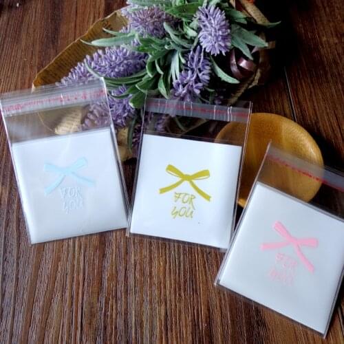 300pcs 7x7cm Pink Blue Gold Bow Self-adhesive Cellophane Bag Biscuit Packing Bag Plastic Party Favor Candy Bag