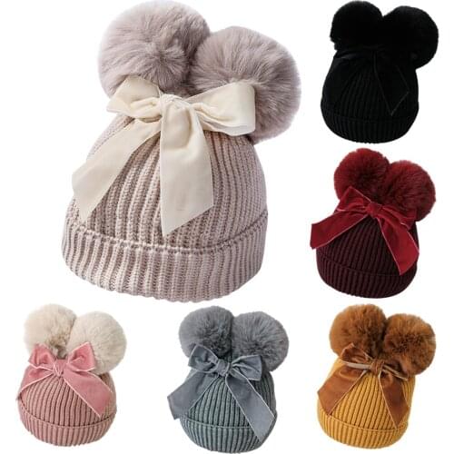 2021 Infant Kids Baby Girl Hats 9 Colors Winter Stuff Double Pompom Balls Bow Bow Warm Thicker Beanie Cap Hat