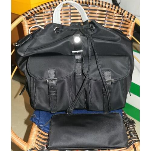 Casual Travel bag with check Solid color top quality men and women Casual bag fashion backpack Oxford leather unisex backpack