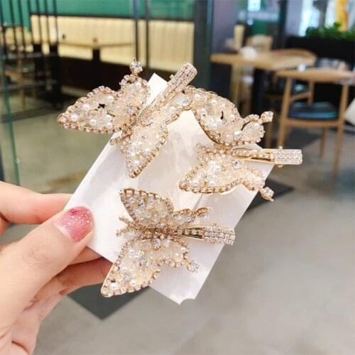 Moving butterfly hairpin headdress hairpin female super fairy fairy sweet nostalgic jitter pearl clip Korea