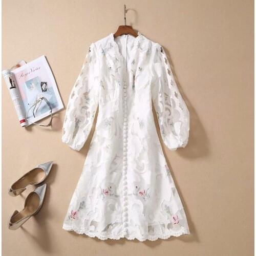 American New European and womens dresses for spring 2021 Lantern sleeve V collar The embroidery Fashionable white dress
