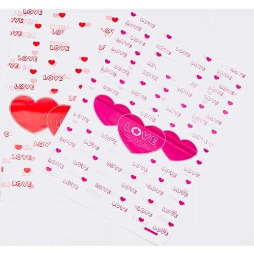 50PCS Hot Pink Heart Print Plastic Handles Bags For Shops 25x35cm Boutique Clothes Packaging Handle Pouches Red Heart