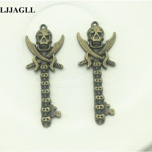 LJJAGLL 20pcs/lot 23*60mm Metal Alloy Bronze Vintage Skulls Keys Jewelry Charms Skeletons Pendants Fit Keychain Diy Make AYS029