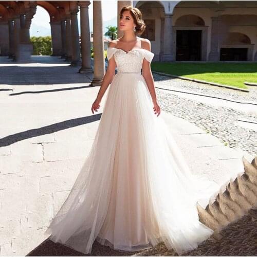 Wedding Dress A-Line Sweetheart Off The Shoulder Backless Lace Appliques Sequined Floor Length Sweep Train Bride Gown 2021