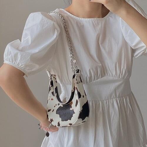 EUMOAN Niche mini cow pattern crescent bag new shoulder chain armpit bag portable female bag messenger small bag