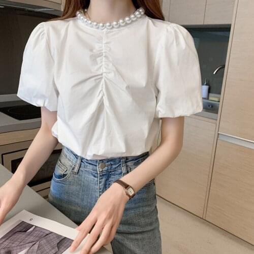 Summer new pearl pure color loose tops women Round neck temperament fashion commute tops for women Puff sleeve women tops 2021