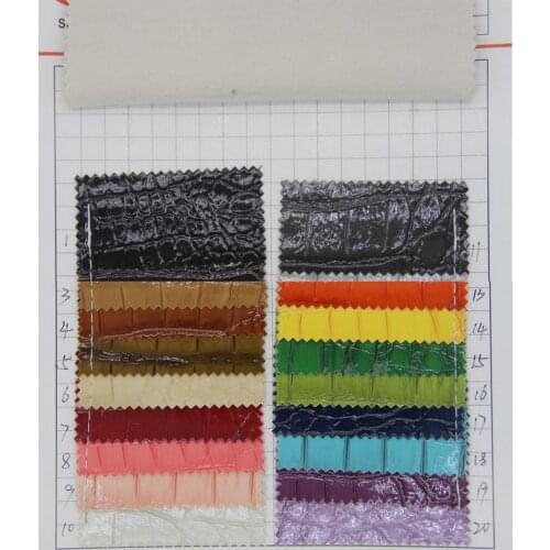 Factory supply crocodile grain leather fabric glossy crocodile embossed artificial PVC leather material wholesale