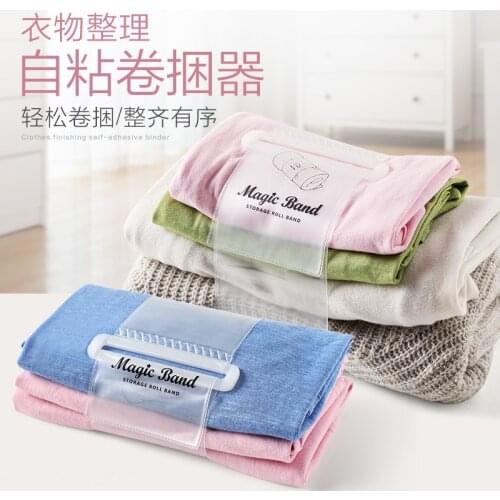 Clothes roll strapping with self-adhesive strapping to facilitate household clothes sorting and storage with travel supplies