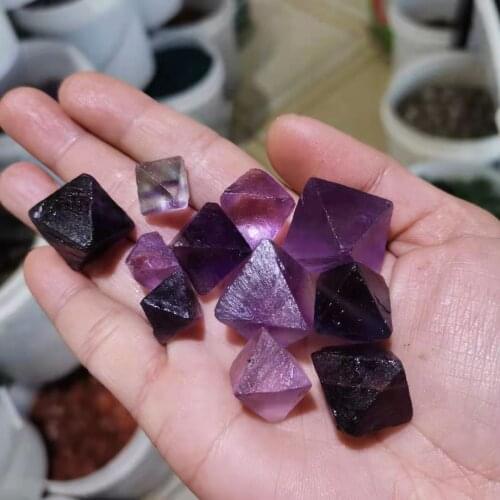 Natural purple fluorite octahedron for decoration