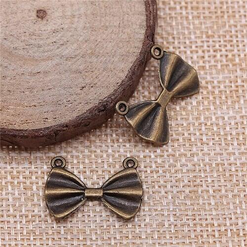 Free shipping 81pcs 21x15mm antique bronze Small bow tie charms diy retro jewelry fit Earring keychain hair card pendant