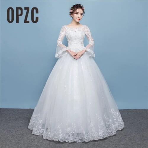 2020 New Style Sexy Illusion Backless Wedding Dress Delicacy Lace Flowers around Ball Gown with Spotted Sequined