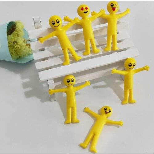 1pcs new strange TPR soft plastic expression yellow villain decompression toy can pull the villain doll toy funny gift