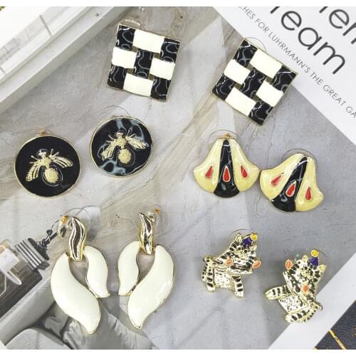 Dripping Earrings kitten Earrings S925 silver needle Earrings European and American retro alloy silver needle Earrings